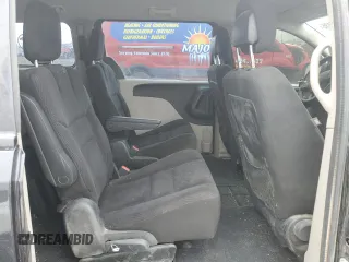 2015 Dodge Grand Caravan SE with VIN 2C4RDGBG7FR516773, listed as a Copart auction lot 52035135 with 132,122 mi miles and Salvage Title. Bid and sale history available at DreamBid. Image 11.