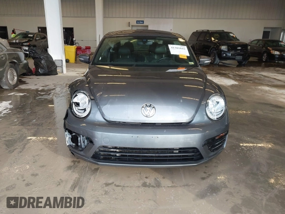 2018 Volkswagen Beetle S z VIN 3VWFD7AT6JM703758, wystawiony jako IAAI lot #41381842 z przebiegiem Nie podano mil oraz . Historia ofert i sprzedaży dostępna na DreamBid. Obrazek 12.