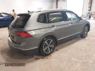 2024 Volkswagen Tiguan Wolfsburg Edition with VIN 3VVAB7AX3RM219372, listed as a IAAI auction lot 42449019 with 2,390 mi miles and . Bid and sale history available at DreamBid. Image 4.