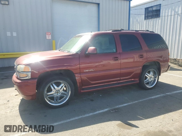 2002 GMC Yukon Denali z VIN 1GKEK63U02J118522, wystawiony jako Copart lot #52031995 z przebiegiem 166 332 mil mil oraz Szkoda całkowita • Salvage title. Historia ofert i sprzedaży dostępna na DreamBid. Obrazek 1.