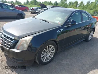 2012 Cadillac CTS Luxury z VIN 1G6DG5E58C0134874, wystawiony jako IAAI lot #42564120 z przebiegiem 121 053 mil mil oraz . Historia ofert i sprzedaży dostępna na DreamBid. Obrazek 2.