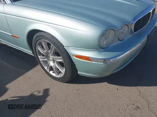 2004 Jaguar XJ 8 with VIN SAJEA71CX4SG10751, listed as a IAAI auction lot 42149348 with 89,786 mi miles and . Bid and sale history available at DreamBid. Image 13.