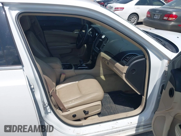 2013 Chrysler 300 with VIN 2C3CCAAG9DH588198, listed as a IAAI auction lot 42556294 with 171,765 mi miles and . Bid and sale history available at DreamBid. Image 5.
