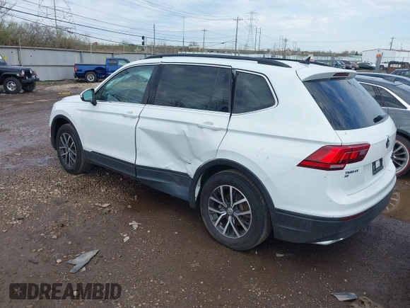 2019 Volkswagen Tiguan SE with VIN 3VV2B7AX7KM125053, listed as a IAAI auction lot 41892539 with 78,865 mi miles and . Bid and sale history available at DreamBid. Image 3.
