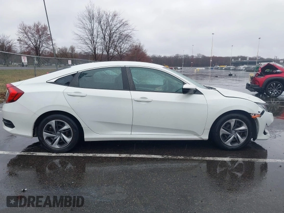 2020 Honda Civic LX with VIN 2HGFC2F66LH510069, listed as a IAAI auction lot 41860480 with 43,639 mi miles and . Bid and sale history available at DreamBid. Image 13.