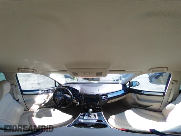 2014 Volkswagen Touareg Sport with VIN WVGEF9BP7ED003525, listed as a IAAI auction lot 41868307 with 74,379 mi miles and . Bid and sale history available at DreamBid. Image 18.