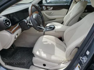 2018 Mercedes-Benz E 300 with VIN WDDZF4KBXJA337966, listed as a Copart auction lot 58718355 with 54,264 mi miles and Salvage title. Bid and sale history available at DreamBid. Image 7.