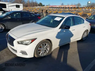 2014 Infiniti Q50 Hybrid Sport with VIN JN1AV7AP5EM690406, listed as a IAAI auction lot 41306387 with 143,309 mi miles and . Bid and sale history available at DreamBid. Image 2.