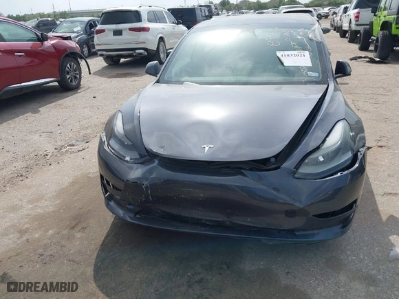 2023 Tesla Model 3 with VIN 5YJ3E1EA2PF481502, listed as a IAAI auction lot 41832021 with 25,709 mi miles. Bid and sale history available at carsss.com. Image 11.
