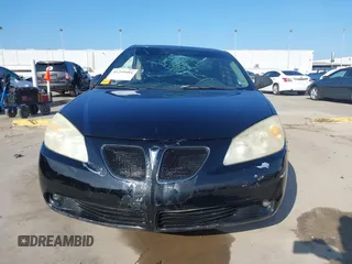 2006 Pontiac G6 6-Cyl z VIN 1G2ZG558264101271, wystawiony jako IAAI lot #41249484 z przebiegiem 237 276 mil mil oraz . Historia ofert i sprzedaży dostępna na DreamBid. Obrazek 13.