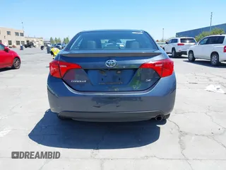 2017 Toyota Corolla L with VIN 5YFBURHE6HP575352, listed as a IAAI auction lot 42417810 with 248,626 mi miles and . Bid and sale history available at DreamBid. Image 16.