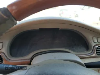 2003 Cadillac Seville Luxury SLS z VIN 1G6KS54Y03U289834, wystawiony jako Copart lot #77362694 z przebiegiem Nie podano mil oraz Szkoda całkowita • Salvage title. Historia ofert i sprzedaży dostępna na DreamBid. Obrazek 9.