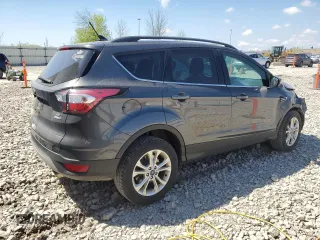 2018 Ford Escape SE z VIN 1FMCU9GD0JUA95941, wystawiony jako Copart lot #56606625 z przebiegiem 137 924 mil mil oraz Nie do naprawy • Non repairable. Historia ofert i sprzedaży dostępna na DreamBid. Obrazek 3.