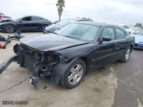 2006 Dodge Charger with VIN 2B3KA43G56H182676, listed as a IAAI auction lot 42052425 with 301,664 mi miles. Bid and sale history available at carsss.com. Image 2.