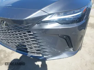 2024 Lexus RX 350 z VIN 2T2BAMBA3RC028022, wystawiony jako IAAI lot #41709161 z przebiegiem 15 945 mil mil oraz . Historia ofert i sprzedaży dostępna na DreamBid. Obrazek 6.