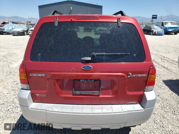 2007 Ford Escape Hybrid z VIN 1FMCU59H77KA61881, wystawiony jako Copart lot #64988665 z przebiegiem 242 536 mil mil oraz Czysty tytuł • Clean title. Historia ofert i sprzedaży dostępna na DreamBid. Obrazek 6.