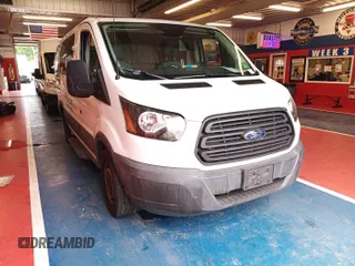 2016 Ford Transit Cargo z VIN 1FTYE1YM3GKB15532, wystawiony jako IAAI lot #42788480 z przebiegiem 64 600 mil mil oraz . Historia ofert i sprzedaży dostępna na DreamBid. Obrazek 23.