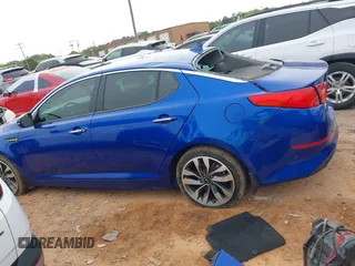 2015 Kia Optima SX z VIN 5XXGR4A76FG478194, wystawiony jako IAAI lot #42037417 z przebiegiem 113 492 mil mil oraz . Historia ofert i sprzedaży dostępna na DreamBid. Obrazek 14.