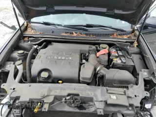 2015 Lincoln MKS z VIN 1LNHL9DK4FG603765, wystawiony jako Copart lot #47533935 z przebiegiem 75 284 mil mil oraz Szkoda całkowita • Salvage title. Historia ofert i sprzedaży dostępna na DreamBid. Obrazek 11.