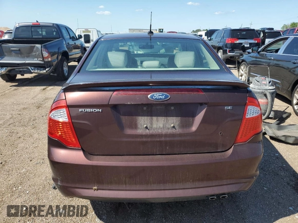 2012 Ford Fusion SE z VIN 3FAHP0HA0CR193143, wystawiony jako Copart lot #62696565 z przebiegiem 150 562 mil mil oraz Szkoda całkowita • Salvage title. Historia ofert i sprzedaży dostępna na DreamBid. Obrazek 6.