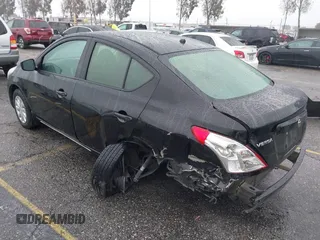 2016 Nissan Versa S Plus with VIN 3N1CN7AP4GL906168, listed as a IAAI auction lot 41562501 with 194,902 mi miles. Bid and sale history available at carsss.com. Image 3.