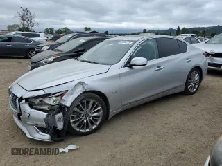 2019 Infiniti Q50 Luxe z VIN JN1EV7AP9KM512639, wystawiony jako Copart lot #53204315 z przebiegiem 93 137 mil mil oraz Szkoda całkowita • Salvage title. Historia ofert i sprzedaży dostępna na DreamBid. Obrazek 1.