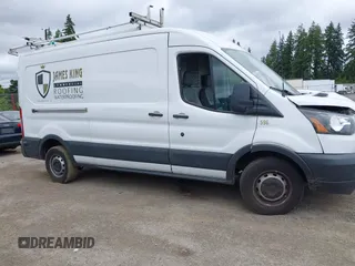 2018 Ford Transit Cargo z VIN 1FTYR2CGXJKB29432, wystawiony jako IAAI lot #42419726 z przebiegiem 80 543 mil mil oraz . Historia ofert i sprzedaży dostępna na DreamBid. Obrazek 13.