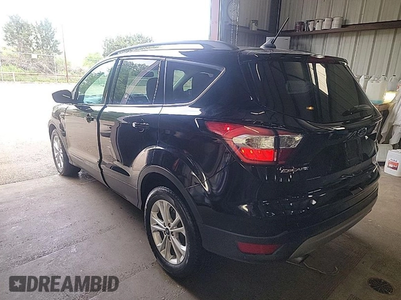 2018 Ford Escape SEL with VIN 1FMCU0HD4JUA75735, listed as a IAAI auction lot 42068983 with 96,935 mi miles and . Bid and sale history available at carsss.com. Image 1.