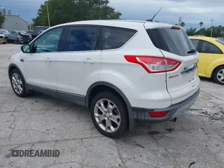 2013 Ford Escape SEL z VIN 1FMCU9HX5DUC33079, wystawiony jako IAAI lot #42521744 z przebiegiem 133 864 mil mil oraz . Historia ofert i sprzedaży dostępna na DreamBid. Obrazek 3.