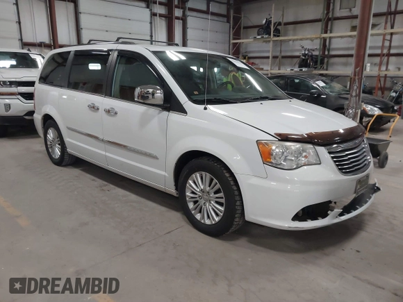 2014 Chrysler Town & Country Limited with VIN 2C4RC1GG7ER178802, listed as a IAAI auction lot 41863918 with 103,777 mi miles and . Bid and sale history available at DreamBid. Image 1.