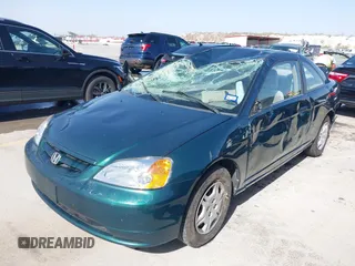 2001 Honda Civic LX with VIN 1HGEM21551L111533, listed as a IAAI auction lot 41801139 with 253,497 mi miles. Bid and sale history available at carsss.com. Image 17.