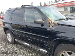 2006 Ford Escape Limited with VIN 1FMYU94176KD46991, listed as a IAAI auction lot 41312961 with 197,241 mi miles. Bid and sale history available at carsss.com. Image 13.
