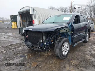 2014 Jeep Grand Cherokee Laredo with VIN 1C4RJFAGXEC109865, listed as a IAAI auction lot 41971070 with 129,460 mi miles. Bid and sale history available at carsss.com. Image 6.