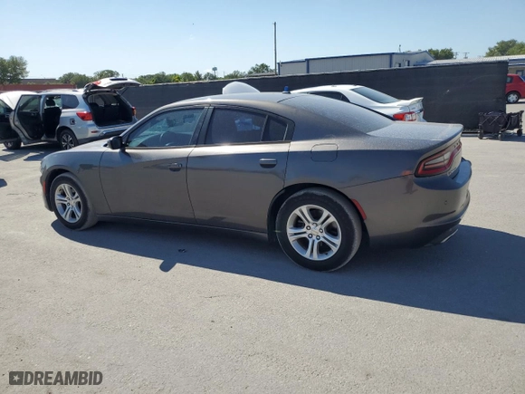 2015 Dodge Charger SE with VIN 2C3CDXBG2FH897299, listed as a Copart auction lot 52716975 with 122,426 mi miles and Salvage Title. Bid and sale history available at carsss.com. Image 2.