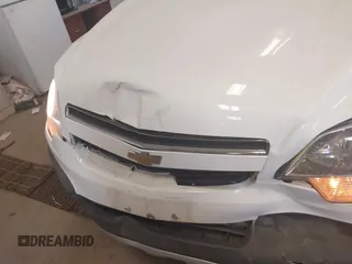 2014 Chevrolet Captiva Sport LS with VIN 3GNAL2EK9ES648395, listed as a IAAI auction lot 42261664 with 128,360 mi miles and . Bid and sale history available at DreamBid. Image 6.