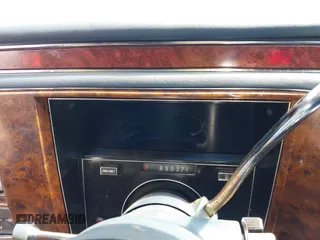 1991 Cadillac Brougham z VIN 1G6DW547XMR708197, wystawiony jako IAAI lot #42112042 z przebiegiem Nie podano mil oraz . Historia ofert i sprzedaży dostępna na DreamBid. Obrazek 7.