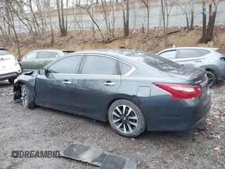 2018 Nissan Altima SV with VIN 1N4AL3AP3JC205875, listed as a IAAI auction lot 41892855 with 159,630 mi miles and . Bid and sale history available at DreamBid. Image 15.