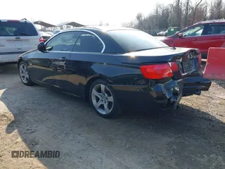 2013 BMW 3 Series 335i with VIN WBADX7C52DJ590132, listed as a IAAI auction lot 41486602 with 154,984 mi miles and . Bid and sale history available at DreamBid. Image 3.