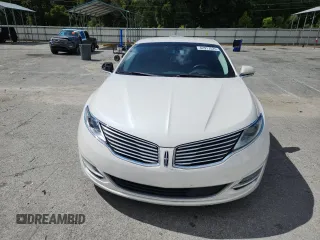 2016 Lincoln MKZ z VIN 3LN6L2G90GR616997, wystawiony jako Copart lot #62917525 z przebiegiem 194 744 mil mil oraz Szkoda całkowita • Salvage title. Historia ofert i sprzedaży dostępna na DreamBid. Obrazek 5.
