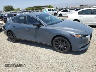 2022 Mazda 3 Carbon Edition with VIN JM1BPACL6N1507664, listed as a Copart auction lot 57847125 with 34,258 mi miles and Salvage title. Bid and sale history available at DreamBid. Image 4.