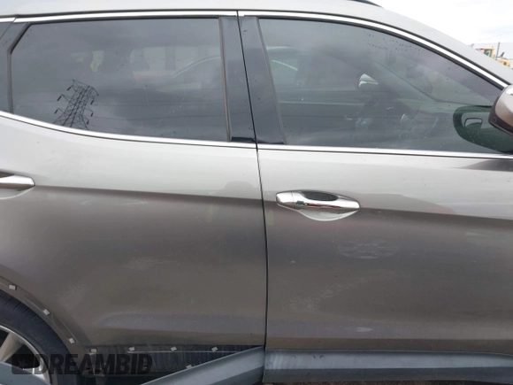 2013 Hyundai Santa Fe Sport z VIN 5XYZU3LA4DG085412, wystawiony jako IAAI lot #42016302 z przebiegiem 121 484 mil mil oraz . Historia ofert i sprzedaży dostępna na DreamBid. Obrazek 14.