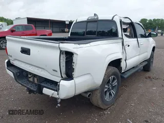 2017 Toyota Tacoma SR5 with VIN 3TMCZ5AN6HM073912, listed as a IAAI auction lot 39958507 with 171,178 mi miles and . Bid and sale history available at DreamBid. Image 4.