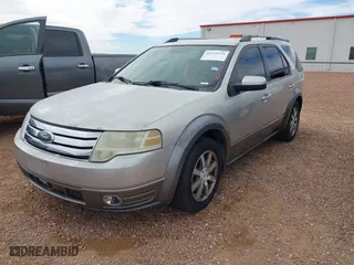 2008 Ford Taurus X SEL with VIN 1FMDK05W08GA34981, listed as a IAAI auction lot 41375371 with 233,889 mi miles. Bid and sale history available at carsss.com. Image 2.