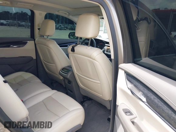 2022 Cadillac XT6 Premium Luxury z VIN 1GYKPCRS4NZ107852, wystawiony jako IAAI lot #42075012 z przebiegiem 66 046 mil mil oraz . Historia ofert i sprzedaży dostępna na DreamBid. Obrazek 8.
