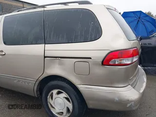 2003 Toyota Sienna LE with VIN 4T3ZF13C93U534860, listed as a IAAI auction lot 41800054 with 214,414 mi miles. Bid and sale history available at carsss.com. Image 6.
