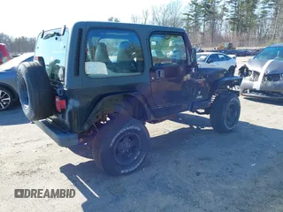 2001 Jeep Wrangler Sport with VIN 1J4FA49S61P357348, listed as a IAAI auction lot 41938170 with 177,356 mi miles. Bid and sale history available at carsss.com. Image 4.