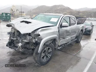 2018 Toyota Tacoma SR5 with VIN 3TMBZ5DN0JM012259, listed as a IAAI auction lot 41709709 with Not provided miles and . Bid and sale history available at DreamBid. Image 2.