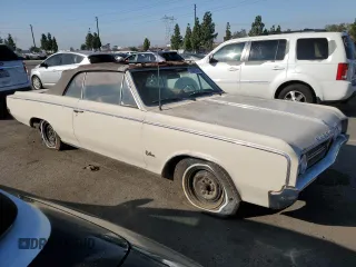 1964 Oldsmobile Cutlass with VIN 824F023233, listed as a Copart auction lot 75574234 with 90,534 mi miles and Clean Title. Bid and sale history available at DreamBid. Image 4.
