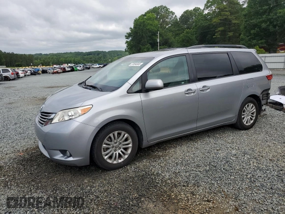 2016 Toyota Sienna XLE with VIN 5TDYK3DC8GS715148, listed as a Copart auction lot 57834045 with 128,769 mi miles and Salvage title. Bid and sale history available at DreamBid. Image 1.