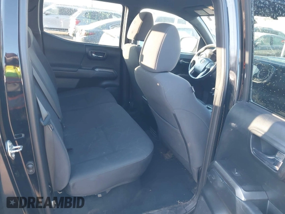 2016 Toyota Tacoma SR with VIN 3TMCZ5AN0GM023263, listed as a IAAI auction lot 41302069 with 137,276 mi miles and . Bid and sale history available at DreamBid. Image 8.